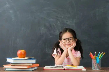 intelligent girl at desk