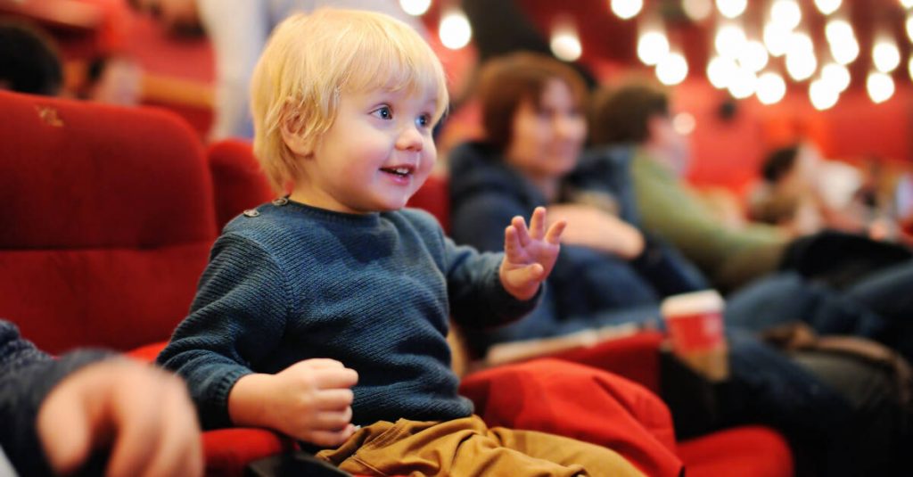 boy enjoying theater in nyc