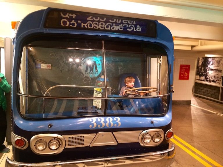 Kids playing in the bus at the Brooklyn Transit Museum