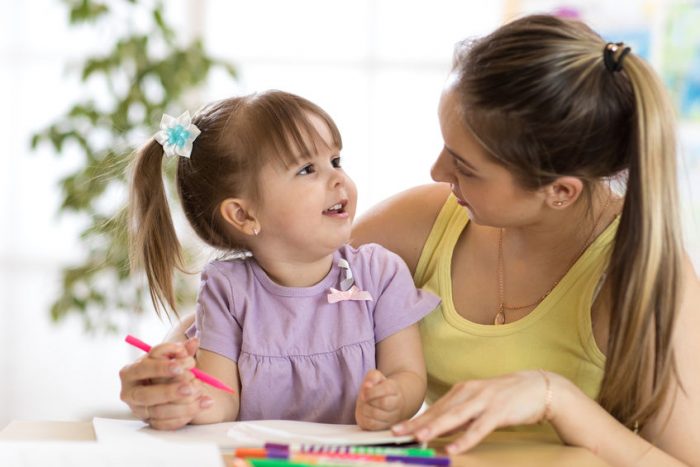 babysitter in nyc, nyc babysitter, babysitter child happy coloring playing crafts