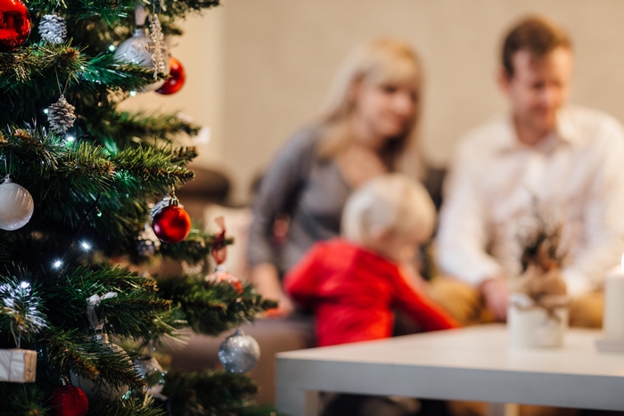 holiday, christmas, christmas tree, family, baby, parents, mom, dad, red, green, silver, lights